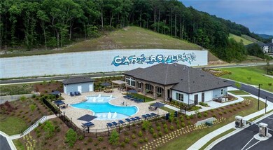 View of subject property featuring a pool