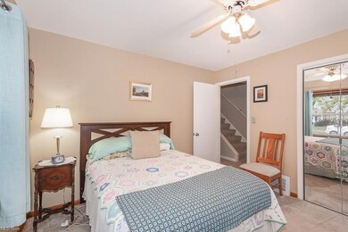 Bedroom featuring light carpet, a closet, and ceil