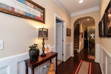 Wainscoting in the entry and crown molding throughout most of the main level