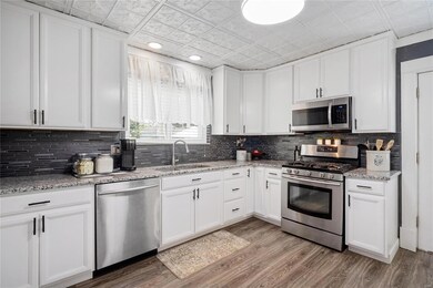 Updated kitchen with fresh white cabinetry