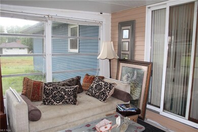 Screened in and heated sunroom can be used all yea