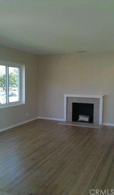 Classic Lines In This Sunny Livingroom With Hardwo