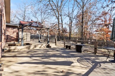 Expansive amount of decking just one and two steps from the ground.  You'll enjoy the privacy this home provides.