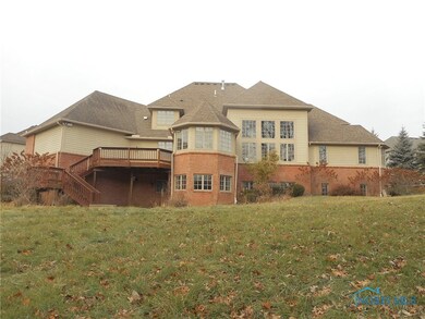 Rear View with Deck and Patio for entertaining!!