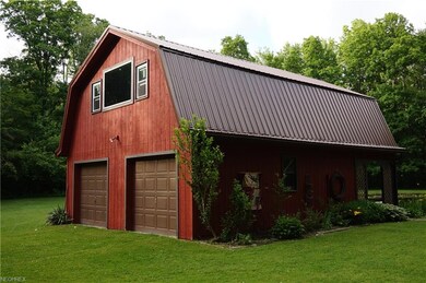 Two story barn: 2 car garage down with open second