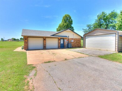 View of front of home with a front yard, brick sid