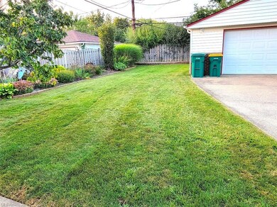 View of yard featuring garage