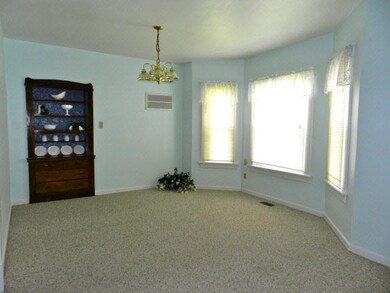 Dining Area with built in hutch. Notice the curved