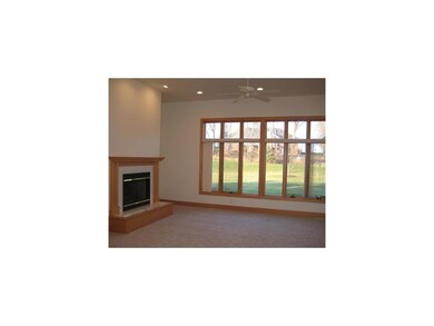 Great Room. Large Anderson windows, woodburning fi
