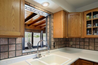 Kitchen View thru AZ Room to Backyar