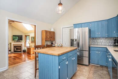Overlooking the family room, this space allows the cook to feel like part of any festivities while allowing for more personal preparations. The eat-in area and seats at the island offer the perfect gathering space to grab a quick bite or a casual mea