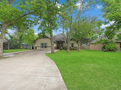 THIS GORGEOUS HOME IS SET BACK BEHIND SEVERAL PECA