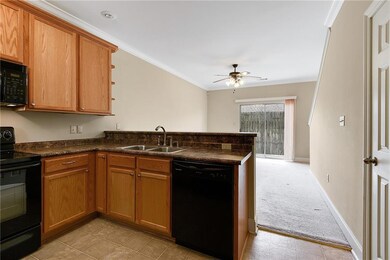 View from entrance of Kitchen and Living Room.  Ha