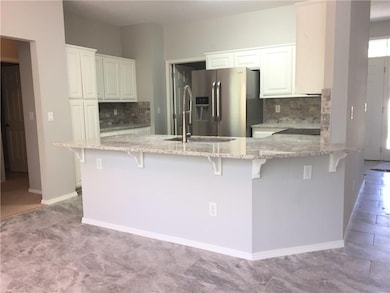 new granite, new tile and backsplash, SS appliances