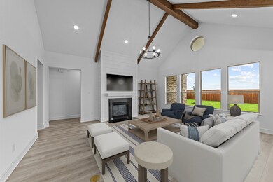 Great room with vaulted ceiling & fireplace