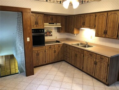 Ceramic tile flooring in your eat-in kitchen.  All appliances stay - just add your finishing touches!
