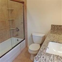 Main Bath with Glass Tub/Shower Enclosure and Cust