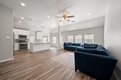 Seamlessly connected kitchen and spacious family r