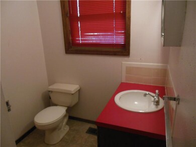 Bathroom. 1/2 bath off laundry room