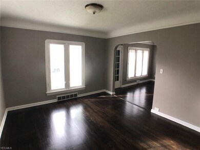 Formal dining room with hardwood floors