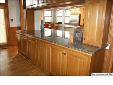 A view of the serving bar with granite counter top