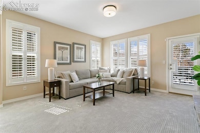 Bright and airy living room with neutral color pal