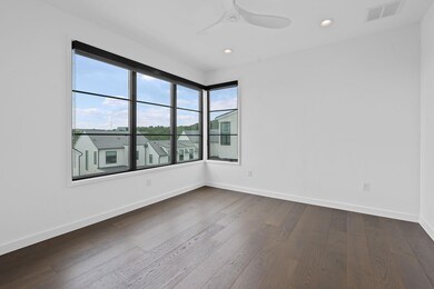Empty room featuring dark wood-style flooring, ce