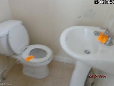 Half bathroom off kitchen