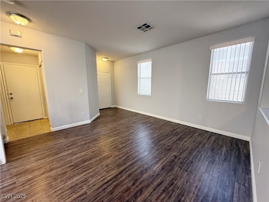 Spare room with wood finished floors and healthy a