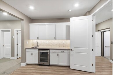 DOWNSTAIR LIVING AREA W/WET BAR/FRIDGE/COFFEE BAR