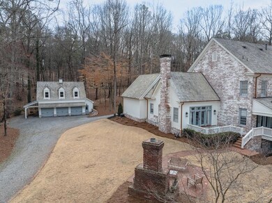 View of property exterior featuring an outbuilding