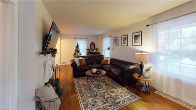 Living Room with beautiful Hardwood Floors.