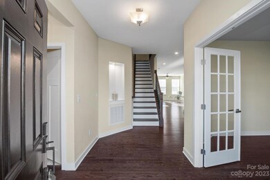 Welcoming entryway with engineered hardwoods throughout the first floor.
