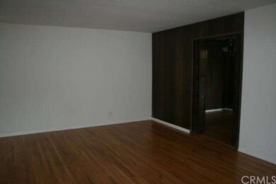 Living room looking into eating area