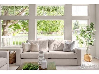 BEAUTIFUL WALL OF WINDOWS TO BACKYARD