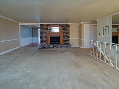 The spacious family room opens to the dining room 