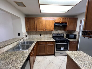 Kitchen with granite countertops