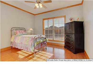 Additional bedroom with wood floors
