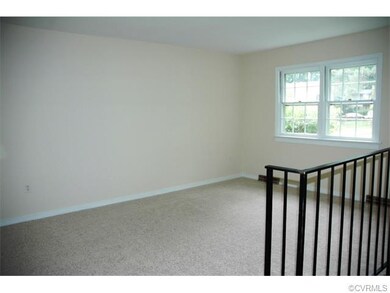 Living Room with new carpet & padding. Double wind