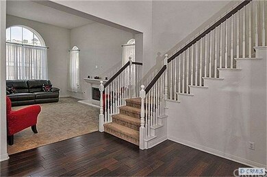 Formal entry with dramatic high ceiling