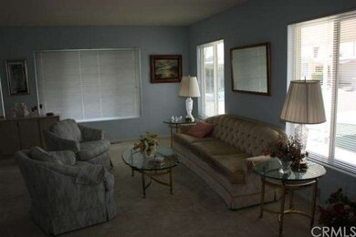 Living room, front door at right lower corner of p