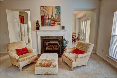 A cozy gas log fireplace welcomes you to sit down with your favorite book and relax.