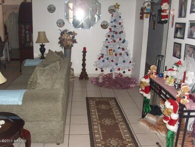 Entry to a cozy, tiled living room