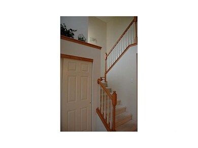 Foyer. Grand Two Story Foyer with Art or Plant she
