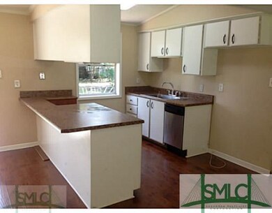 Kitchen. Kitchen has faux granite counter tops wit