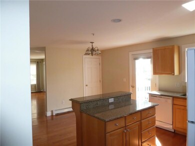 Kitchen and dining area open to...