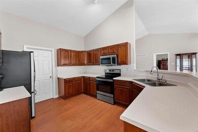 Kitchen that Leads to the Laundry Room and the 2 C