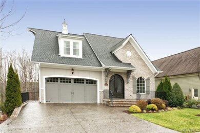 View of front of home featuring a garage