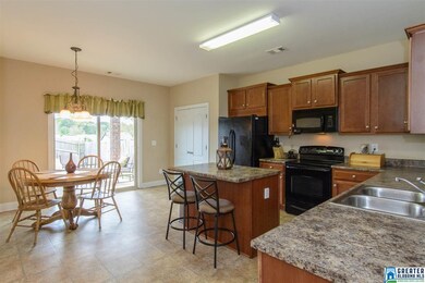 Spacious kitchen with eating space. Double door pa