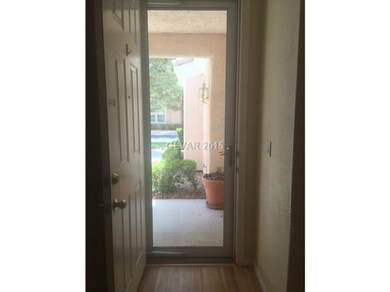 Property Photo. Glass security front door